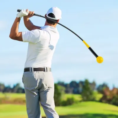 Golfová tréninková pomůcka 100 cm se zátěžovou hlavou pro rytmus úchopu flexibilitu rovnováhu žlutá
