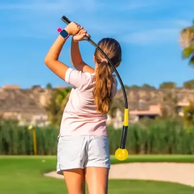Golfová tréninková pomůcka 80 cm se zátěžovou hlavou pro rytmus úchopu flexibilitu rovnováhu žlutá