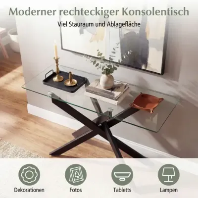 Moderní skleněný stůl s deskou z čirého tvrzeného skla a robustními kovovými nohami, konzolový stolek, černý