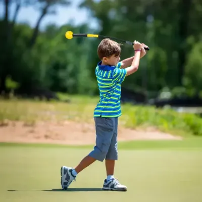Golfová tréninková pomůcka 80 cm se zátěžovou hlavou pro rytmus úchopu flexibilitu rovnováhu žlutá