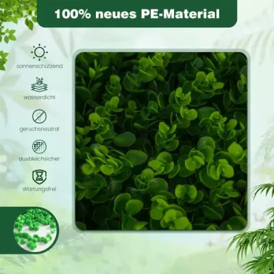 Živé ploty na zeď rostlin se zeleným eukalyptem z umělého břečťanu v zahradě